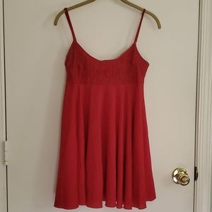 Deep red with lace lingerie. Adjustable straps. Size small